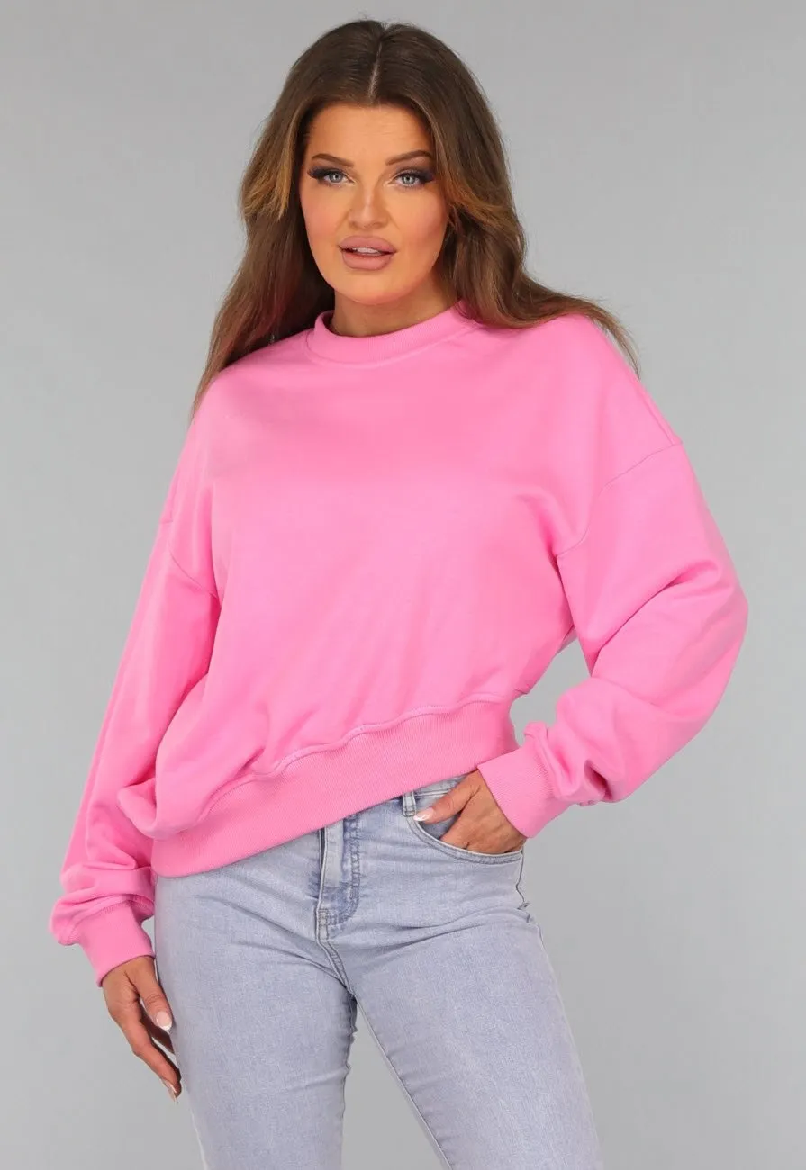 Rosa asymmetrischer Pullover